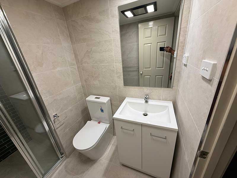 Modern vanity and toilet installation in small bathroom renovation Griffith Canberra